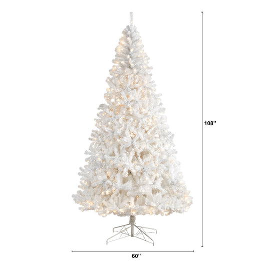 a white christmas tree with lights
