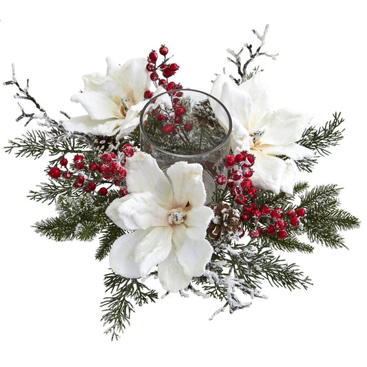 a white flowers and red berries in a glass vase