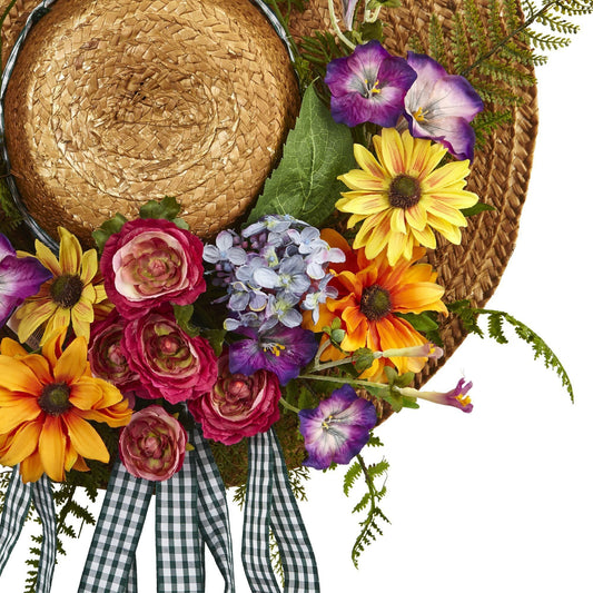 a hat with flowers and ribbons