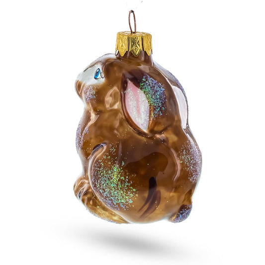 a glass ornament with a rabbit