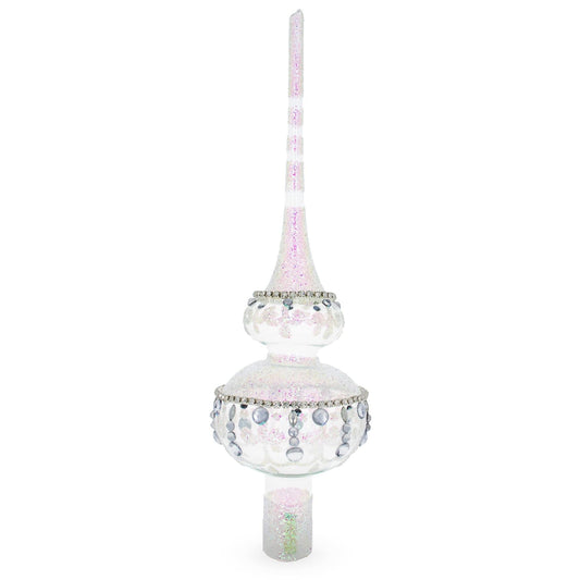 a white and pink christmas tree topper