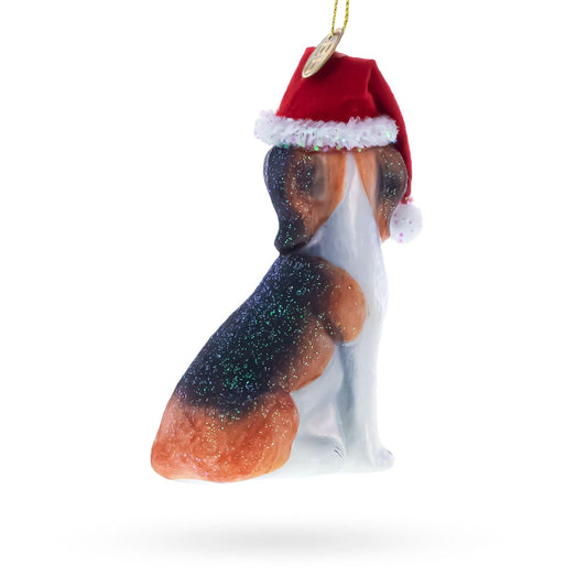 a dog ornament with a hat