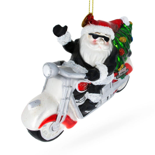 a santa claus on a motorcycle ornament