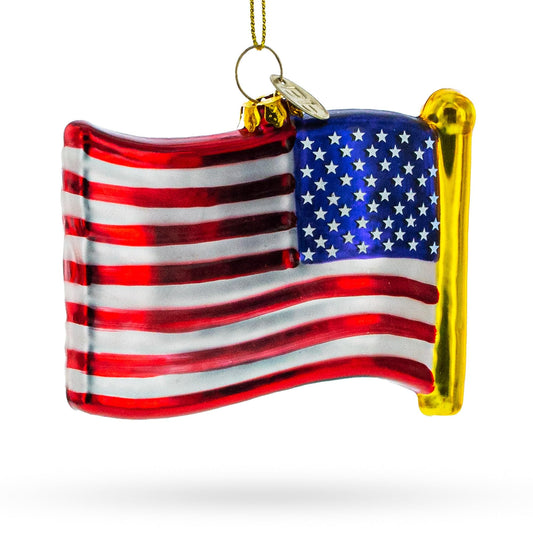 a glass ornament with a flag