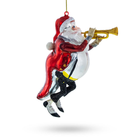 a santa claus ornament with a trumpet