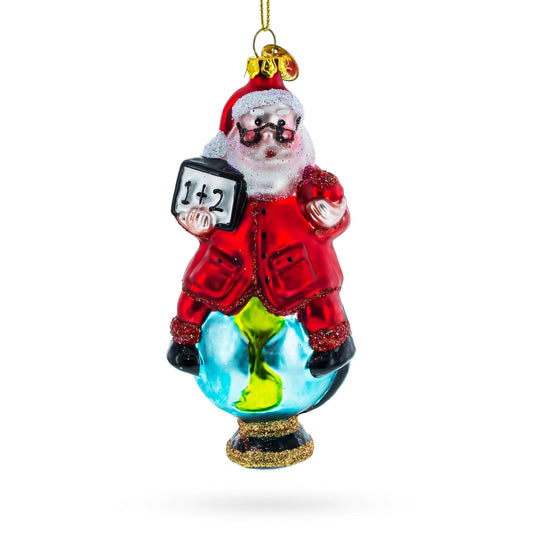 a christmas ornament with santa claus holding a clock