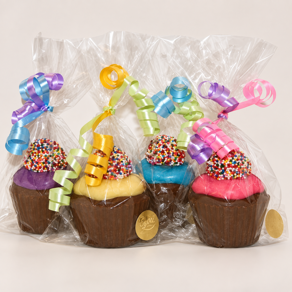 a group of cupcakes wrapped in plastic