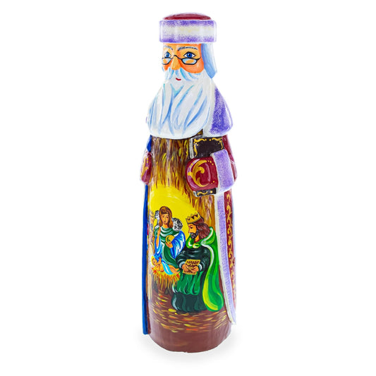 a painted wooden figurine of a man with a beard