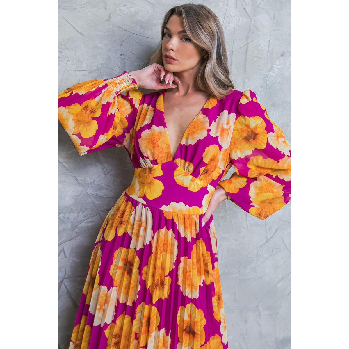 a woman in a floral dress