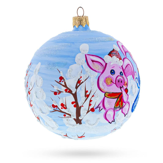 a blue and white ornament with a painted pig