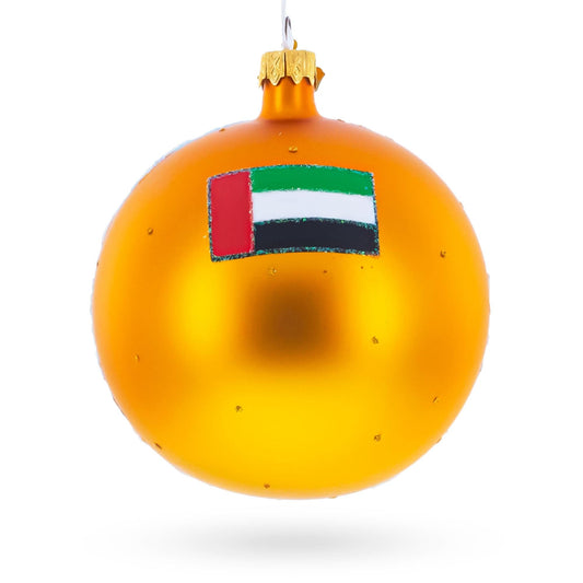 a gold ball with a flag sticker on it