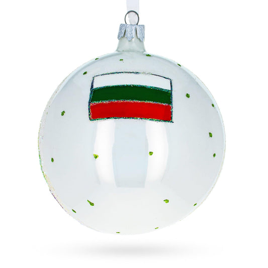a white ball with a red and green flag painted on it
