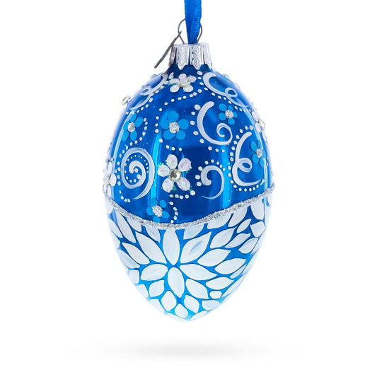 a blue and white decorated egg