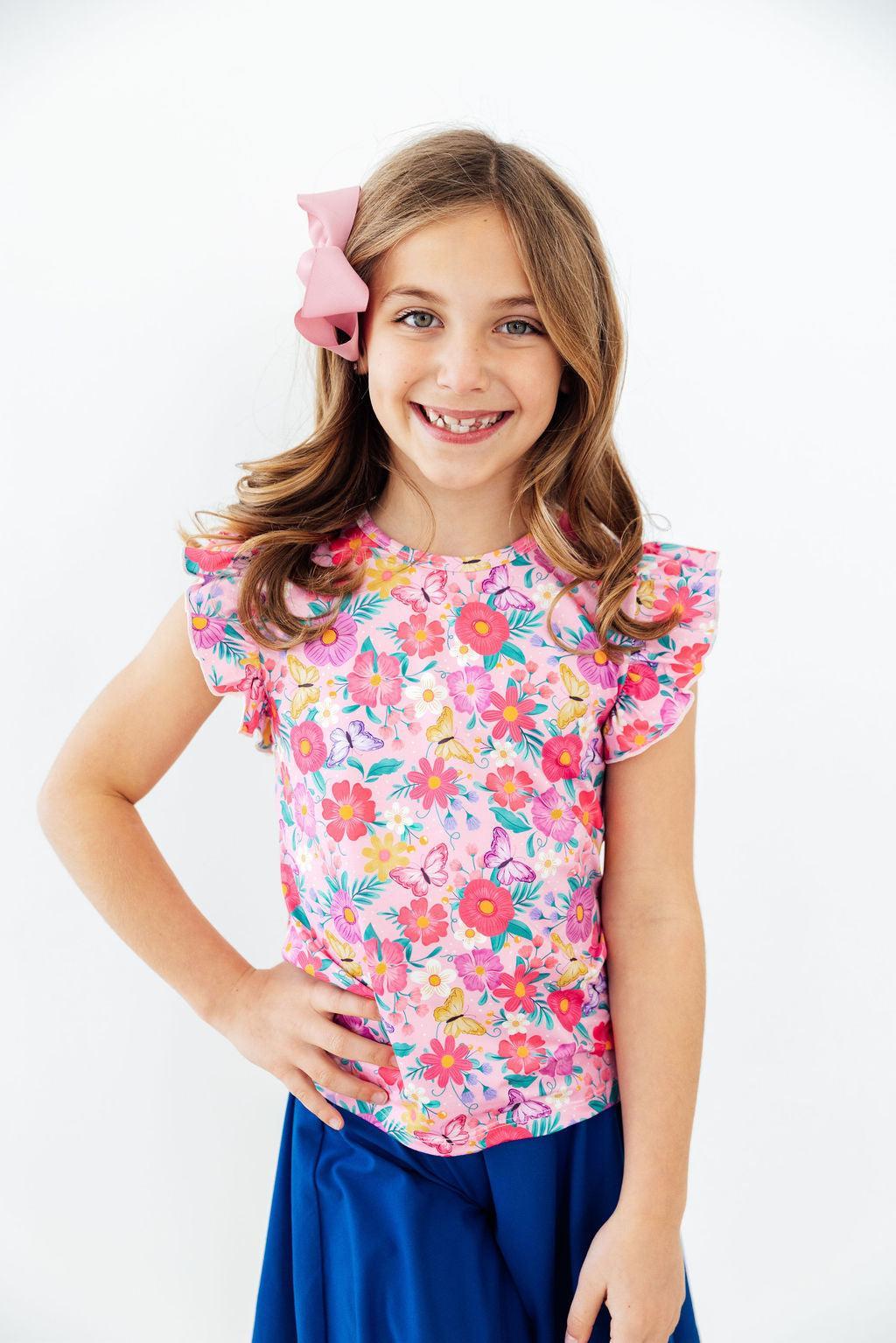 a girl with braces smiling