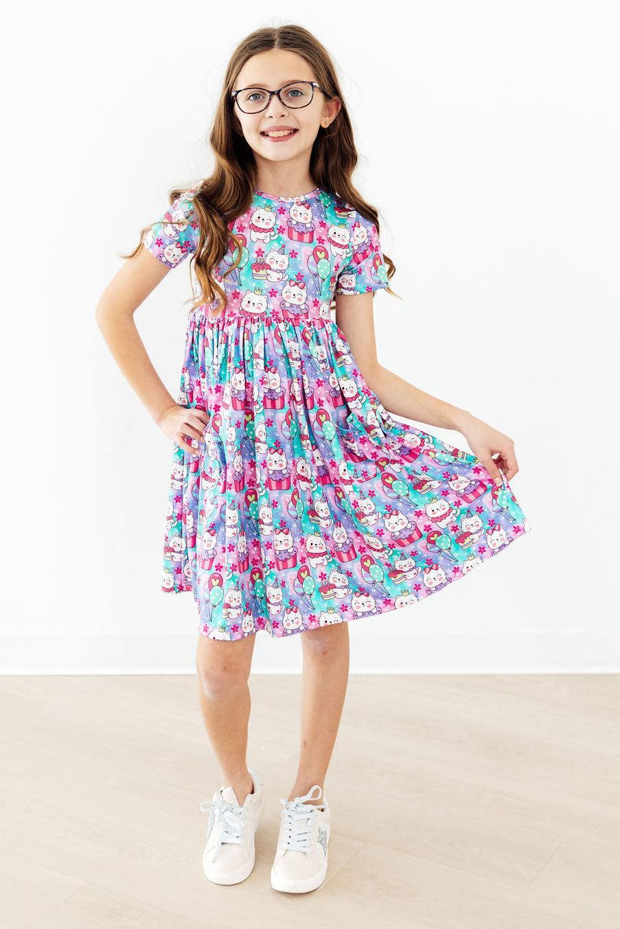 a girl in a dress