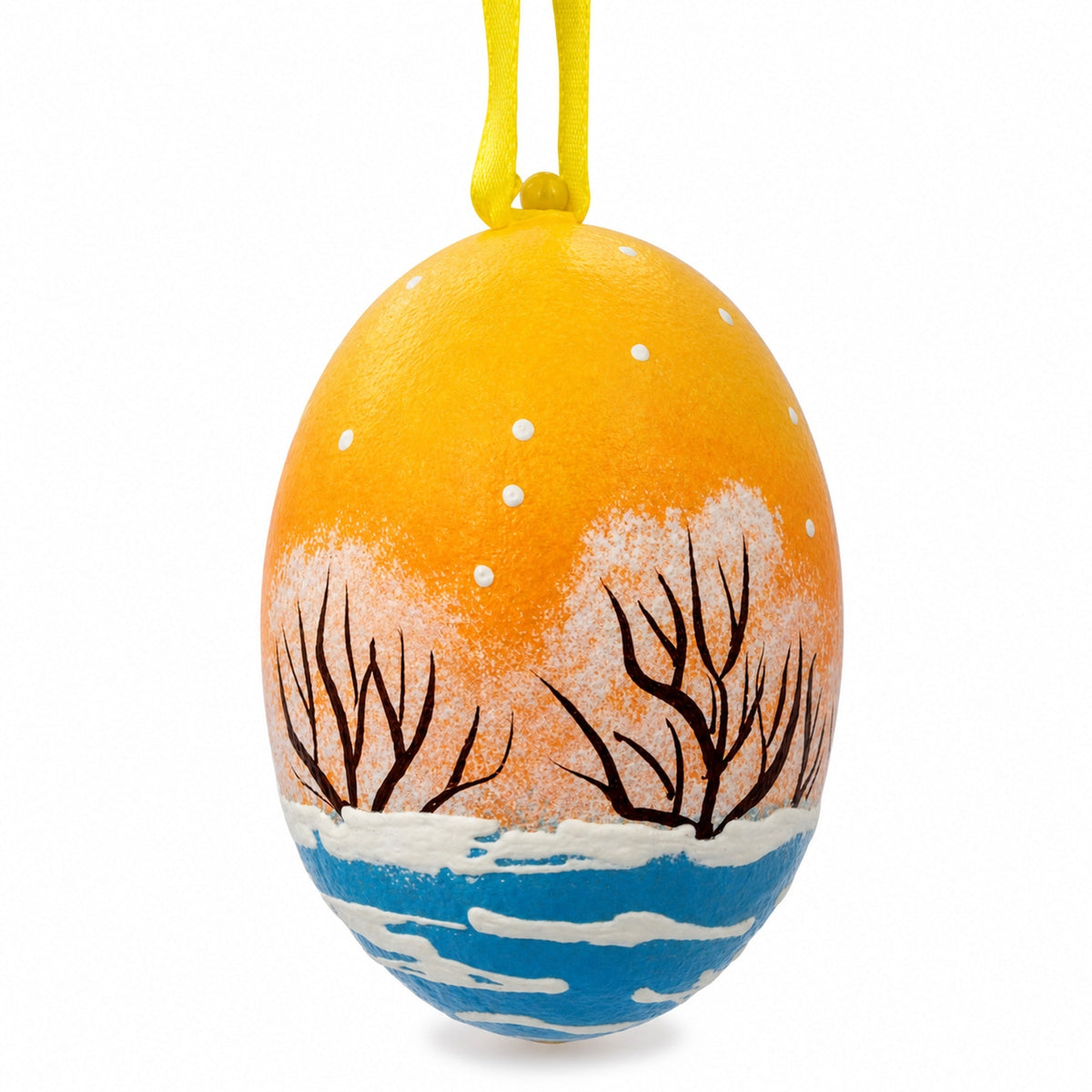 an egg shaped object with a painting on it