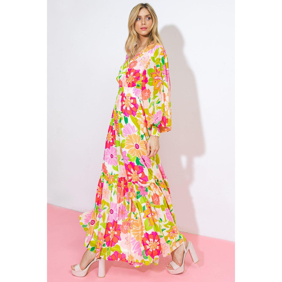 a woman in a floral dress