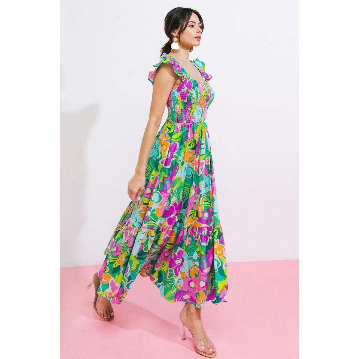 a woman in a colorful dress
