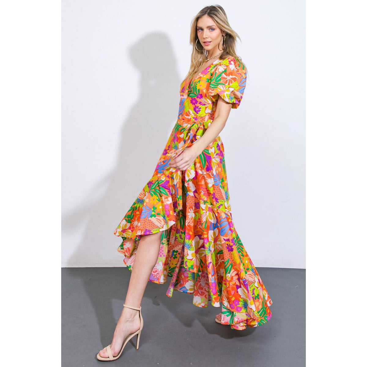 a woman in a colorful dress