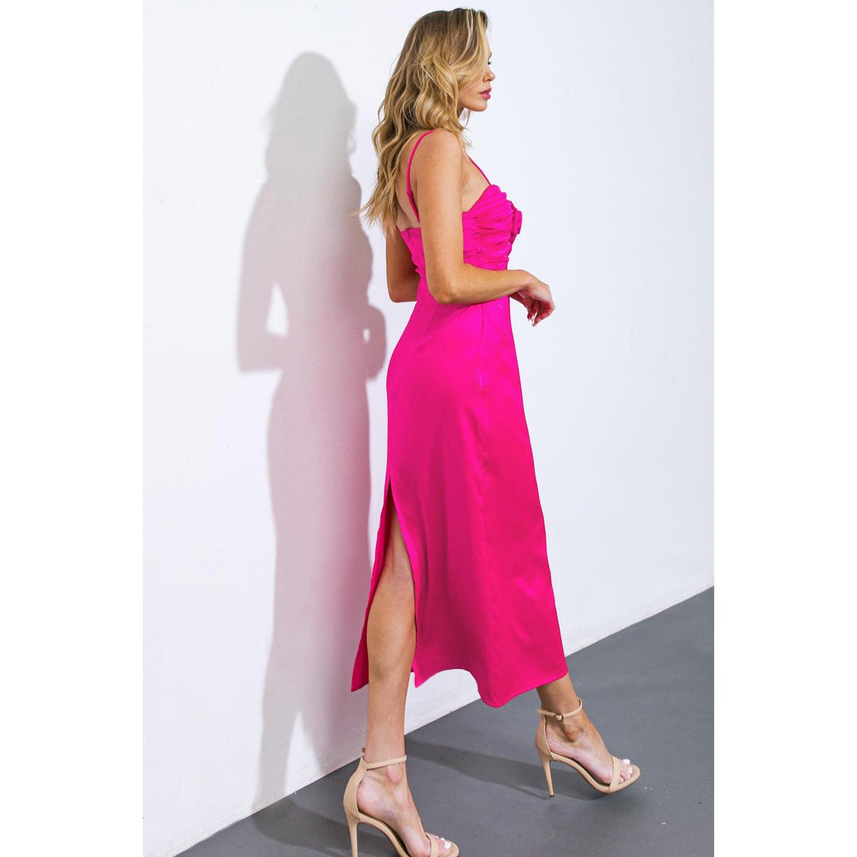 a woman in a pink dress