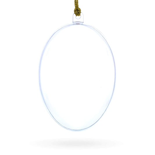 a clear oval shaped object with a gold string