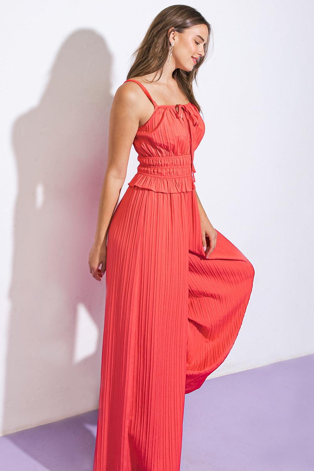 a woman in a red dress
