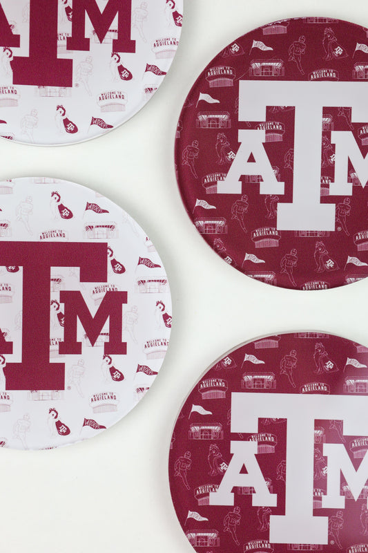 a group of red and white plates with letters on them