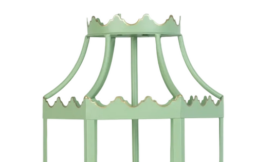 a green and gold metal stand