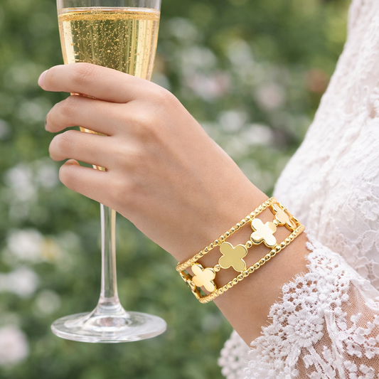 a woman holding a glass of champagne