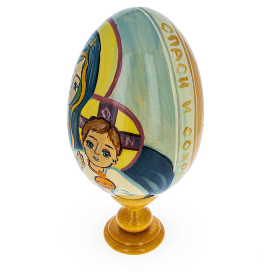 a painted egg on a stand