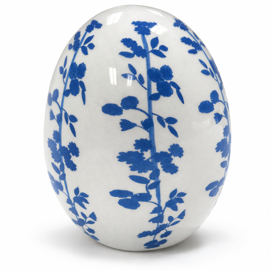 a white and blue painted egg