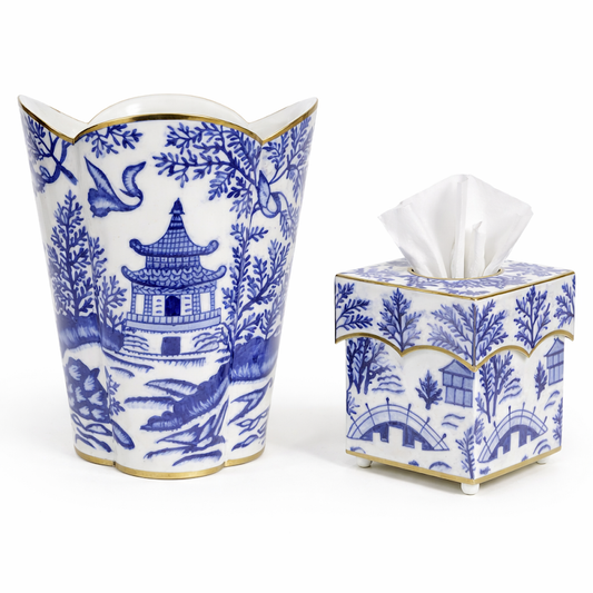 a blue and white china container and tissue box