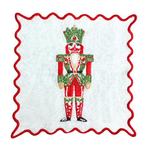 a red and white cloth with a nutcracker