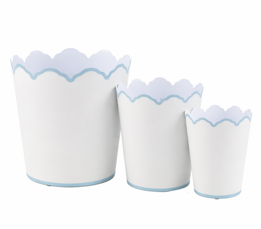 a group of white and blue buckets