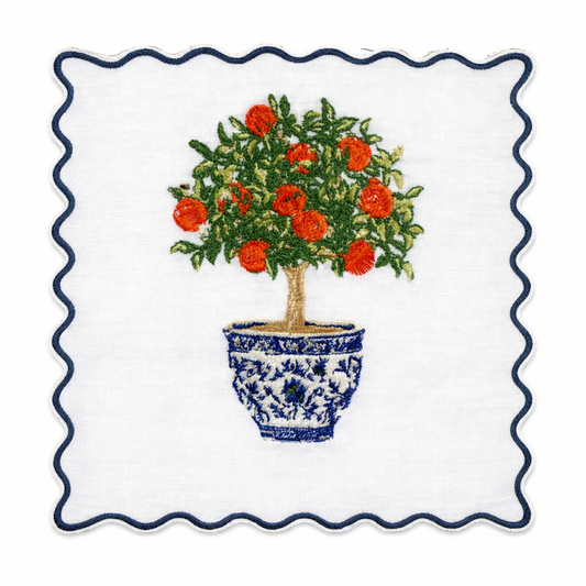 a potted plant embroidered on a white napkin