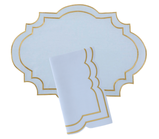 a white and gold placemat