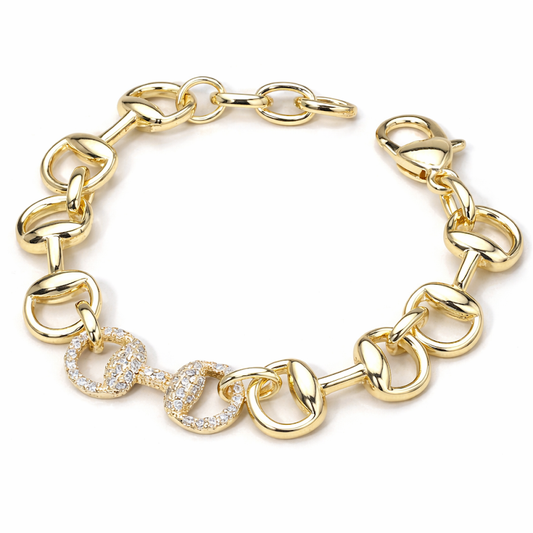 a gold bracelet with diamonds