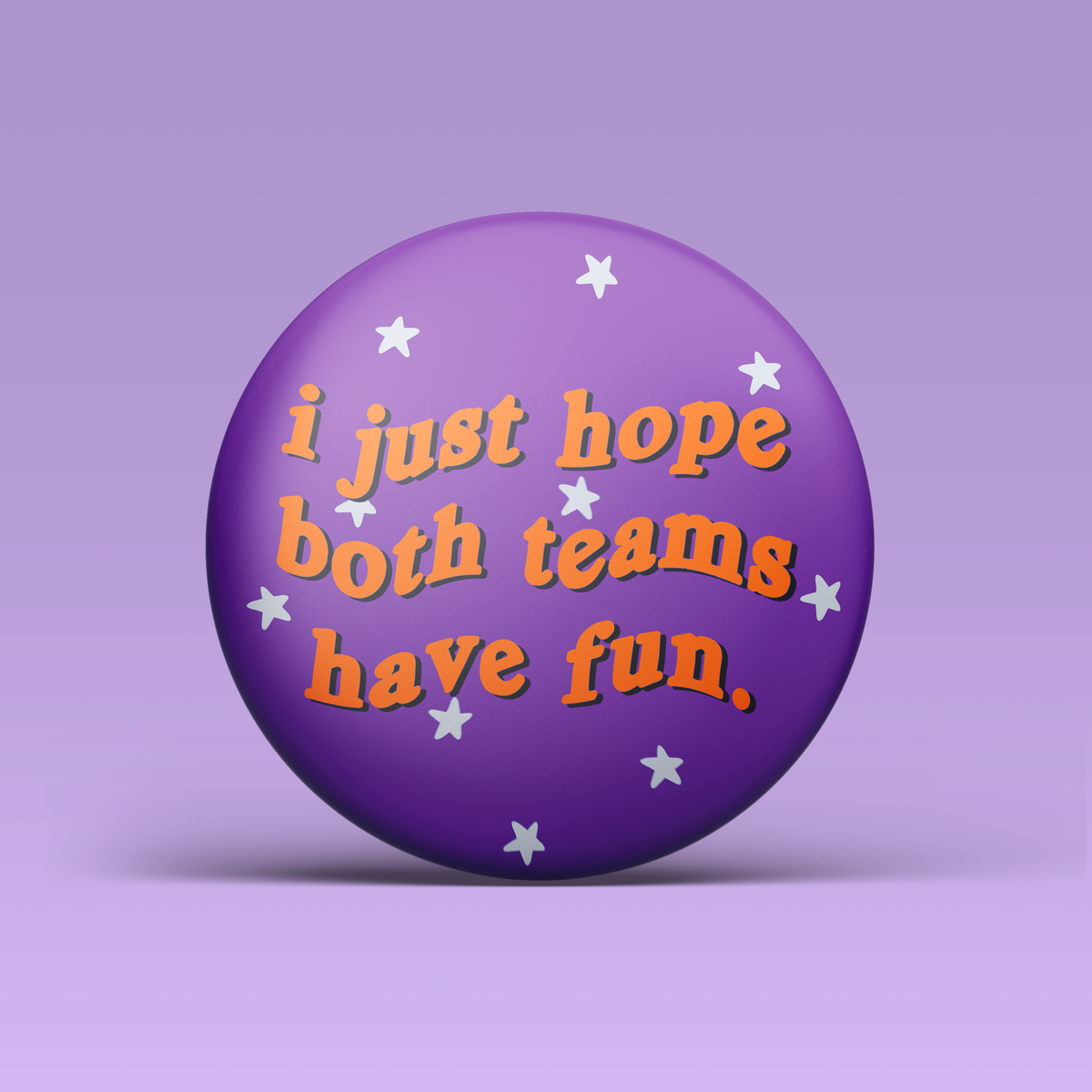 a purple button with white stars and orange text