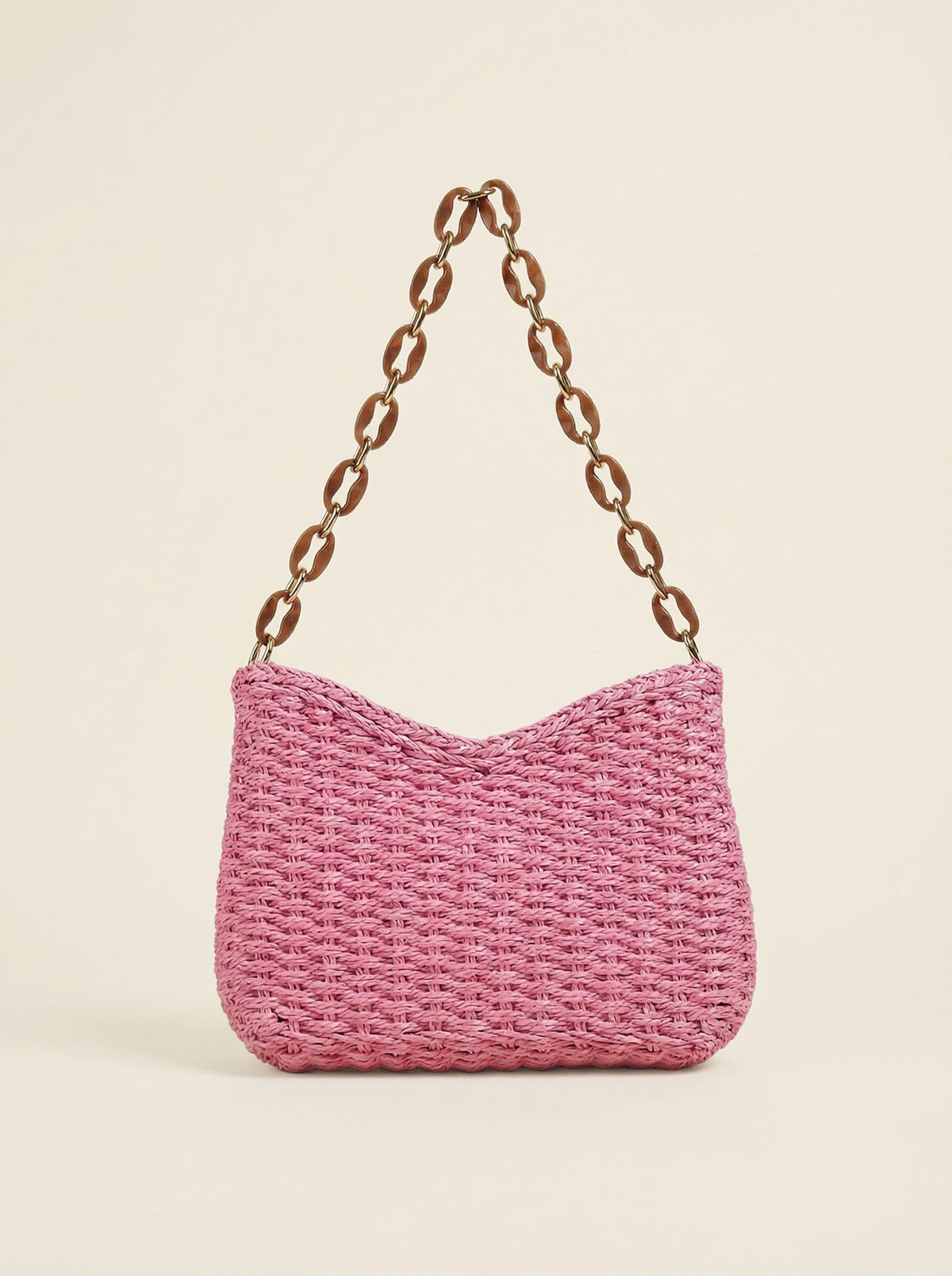 a pink bag with brown chains
