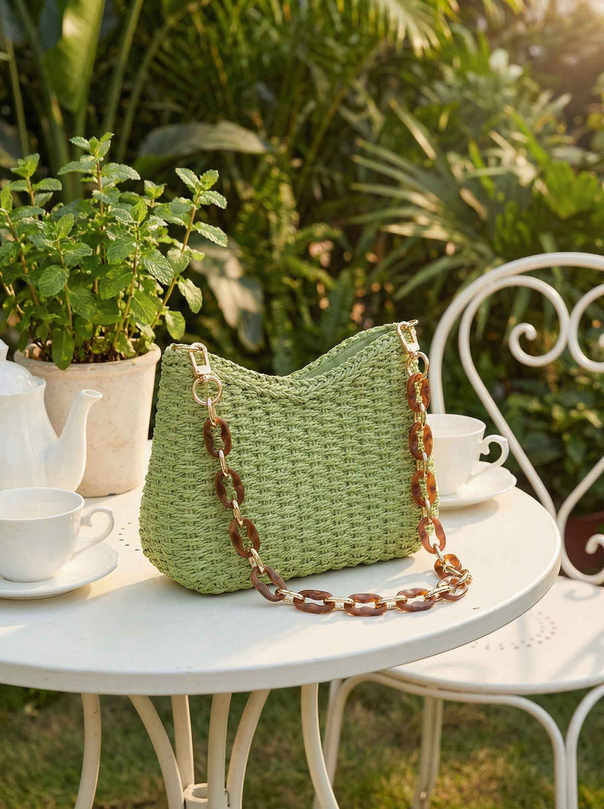 a green knitted purse on a table