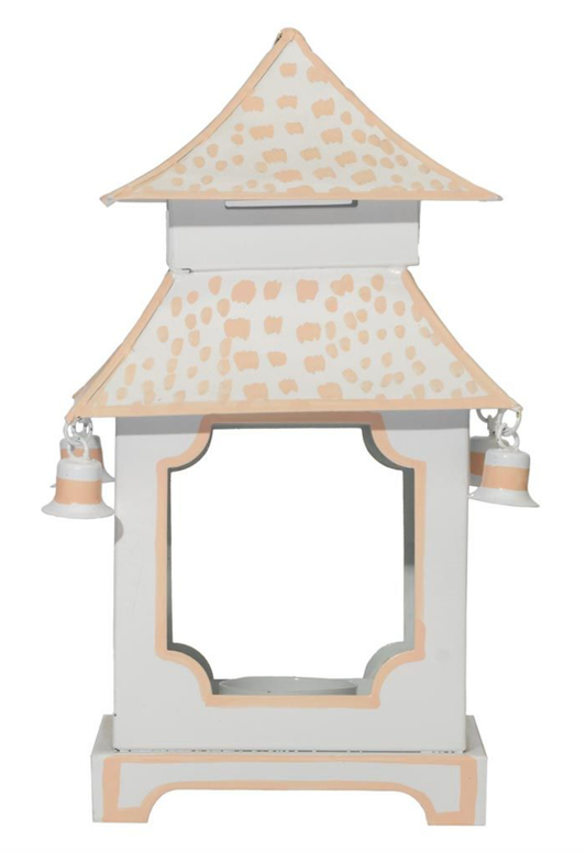 a white and pink lantern