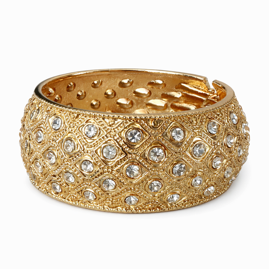a gold bracelet with diamonds