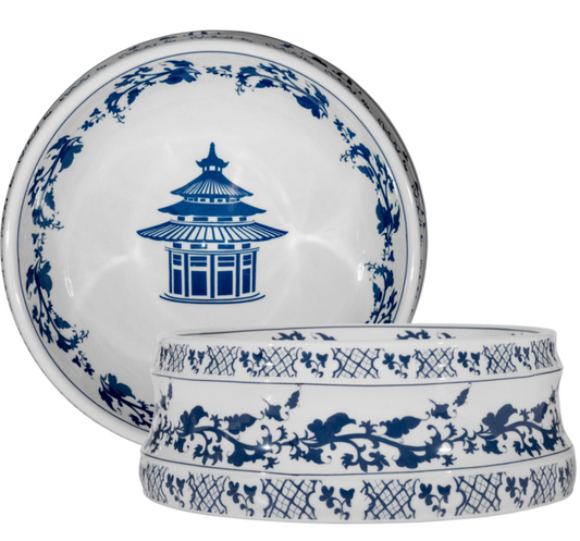 a blue and white bowl with a lid