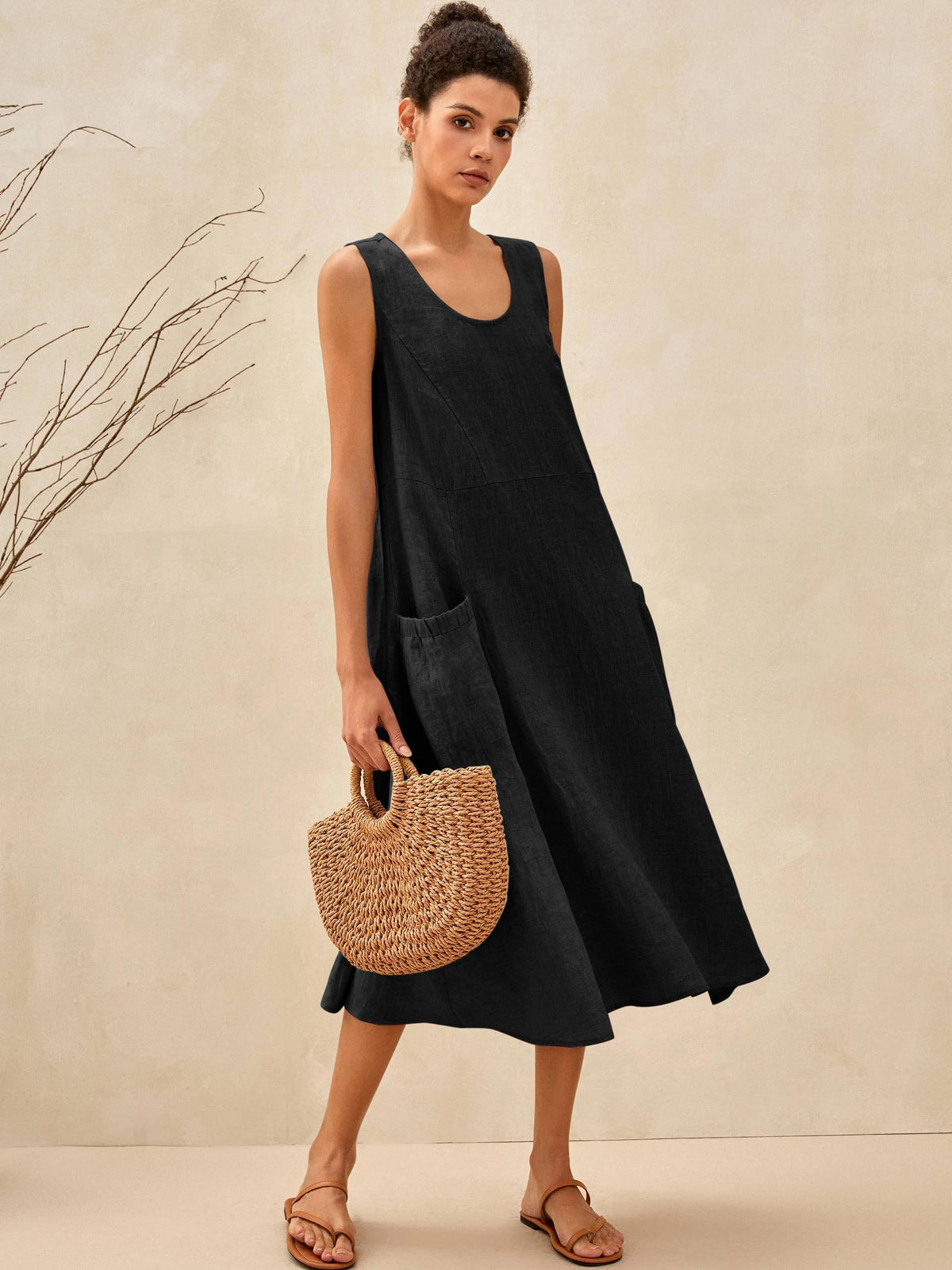 a woman in a black dress