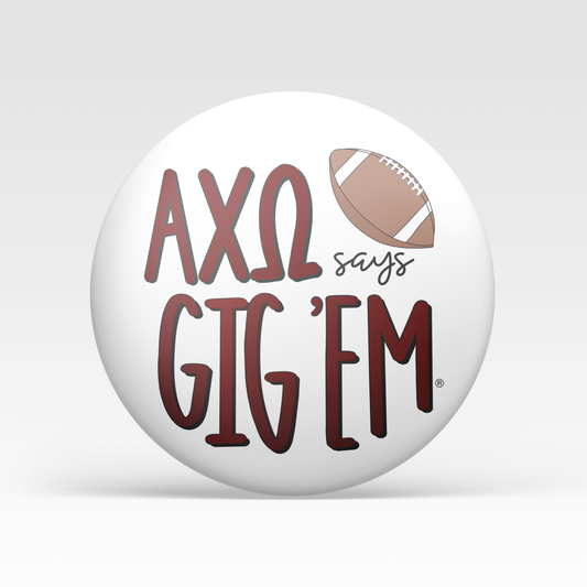 a white ball with red text and a football