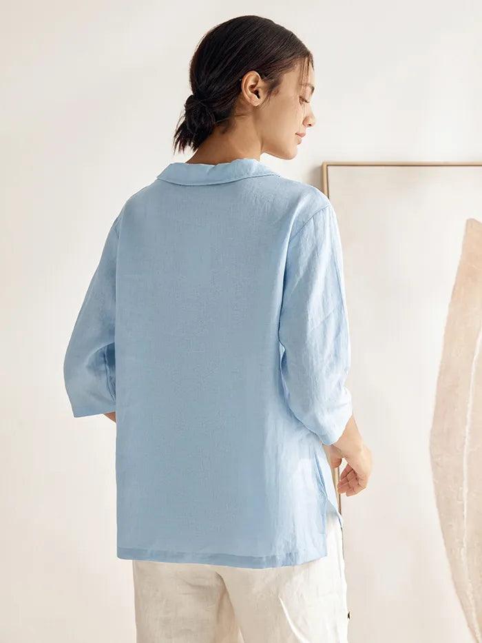 a woman in a blue shirt