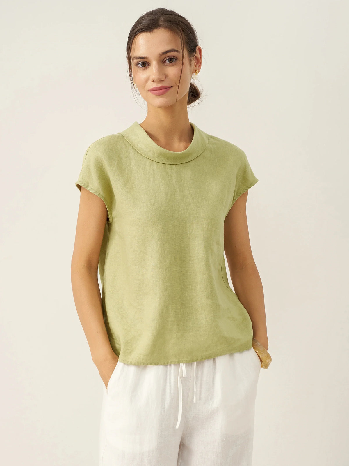 a woman with her hands in her pockets