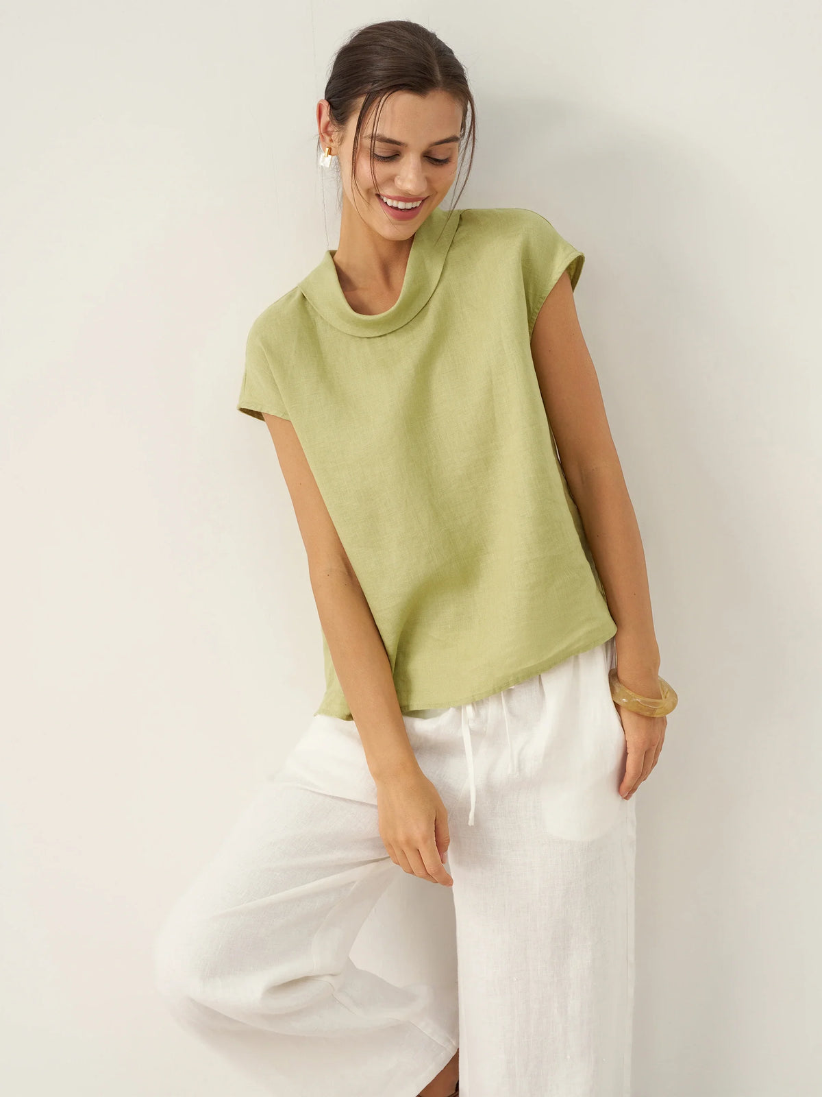 a woman in a green shirt