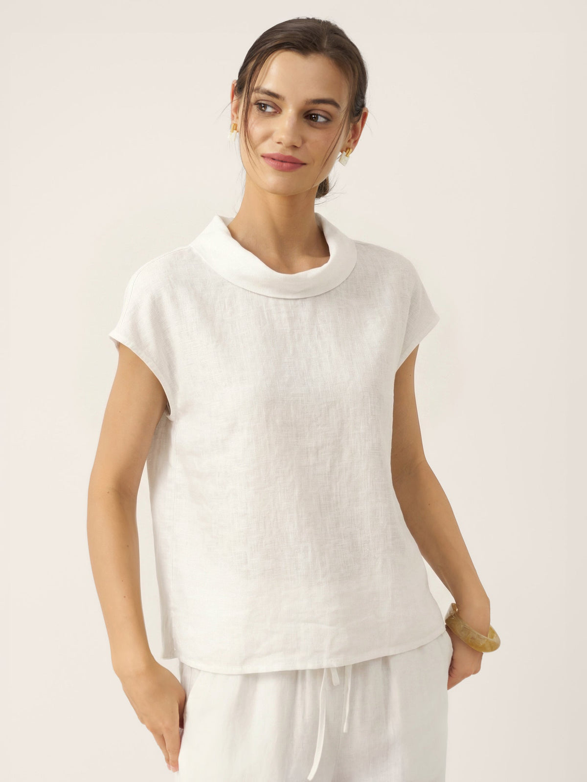 a woman in white clothes