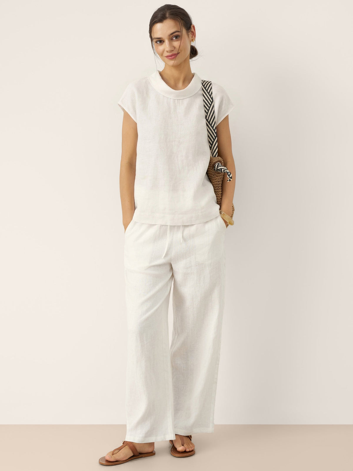 a woman in white outfit